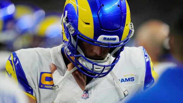 Los Angeles Rams quarterback Matthew Stafford wears a bandage on his throwing hand during the second half of an NFL football game against the Dallas Cowboys Sunday, Oct. 29, 2023, in Arlington, Texas. (AP Photo/Julio Cortez)   